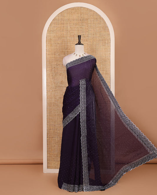 Violet Swarovski crystal stone embedded fendy chiffon saree, scallop Swarovski stone embroidered border, and contrast plain blouse