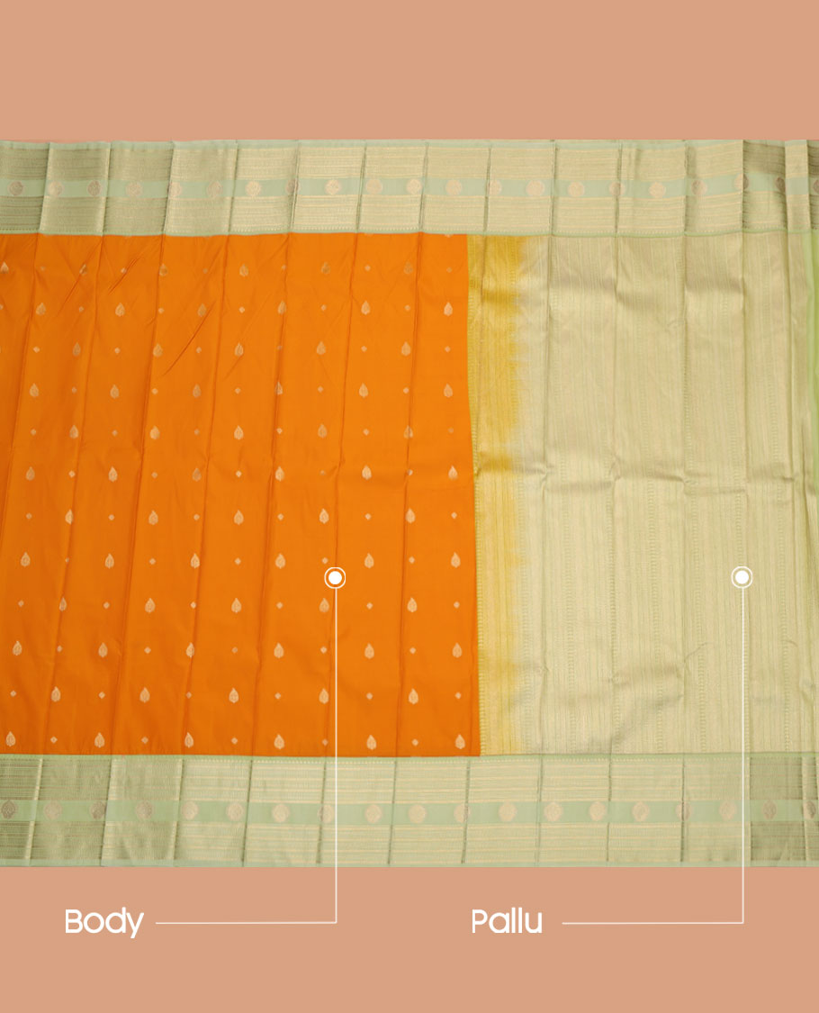 Orange Budget Silk Saree, Featuring Zari Buttas All Over Its Body, Complemented by a Contrast Traditional Zari Design Border, a Pallu Steeped with Traditional Design, and Paired with a Contrast Blouse