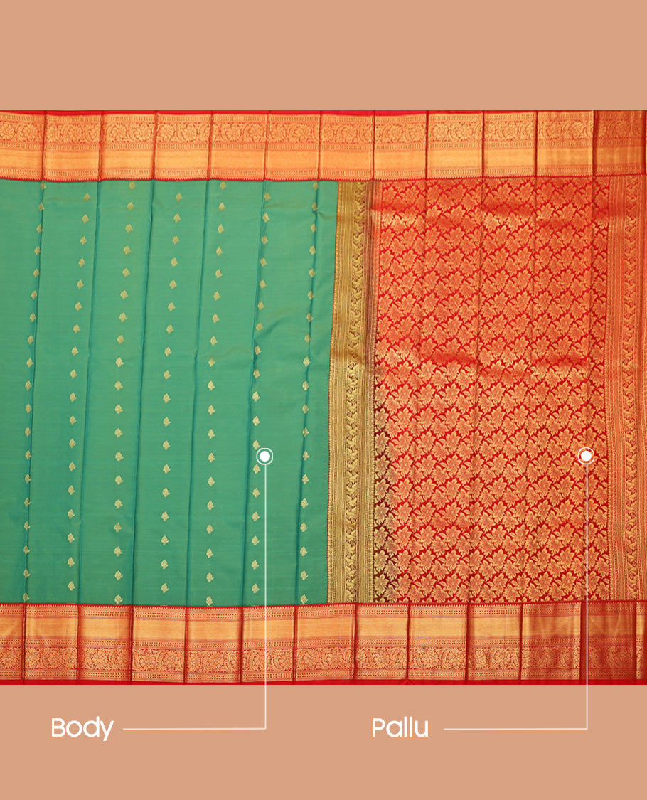 Green Budget Silk Saree, Artfully Detailed with Zari Buttas All Over Its Body, Complemented by a Contrast Traditional Zari Design Border, Pallu of Floral Designs, and Paired with a Contrast Blouse