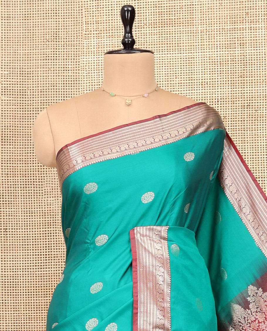 Green Budget Silk Saree, Beautified with Zari Buttas, Complemented by Contrast Traditional Zari Border, Pallu of Floral Design, and Contrast Blouse