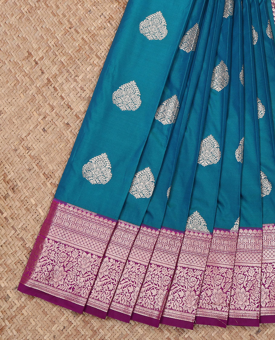 Blue Budget Silk Saree, Detailed with Zari Buttas All Over Its Body, Complemented by a Contrast Traditional Zari Design Border, Intricately Designed Pallu, and Paired with a Contrast Blouse