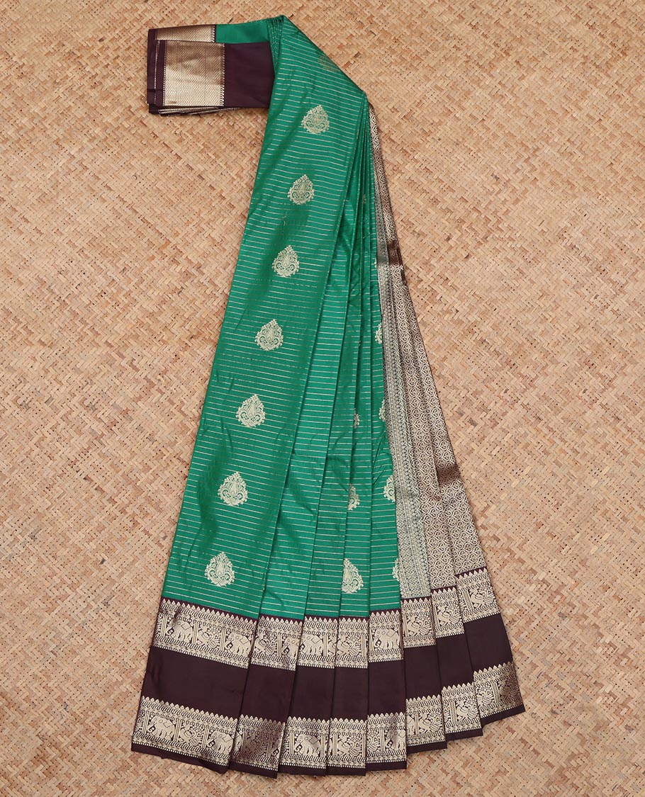 Green Budget Silk Saree, Prettified with Stripes and Floral Buttas, a Contrast Rettai Pettu Zari Border, a Grand Pallu and a Contrast Blouse