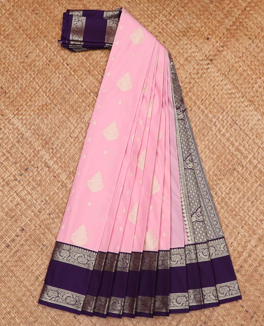 Pink zari buttas gift saree, contrast traditional zari rettai pettu border, and pallu of jaal and paisleys