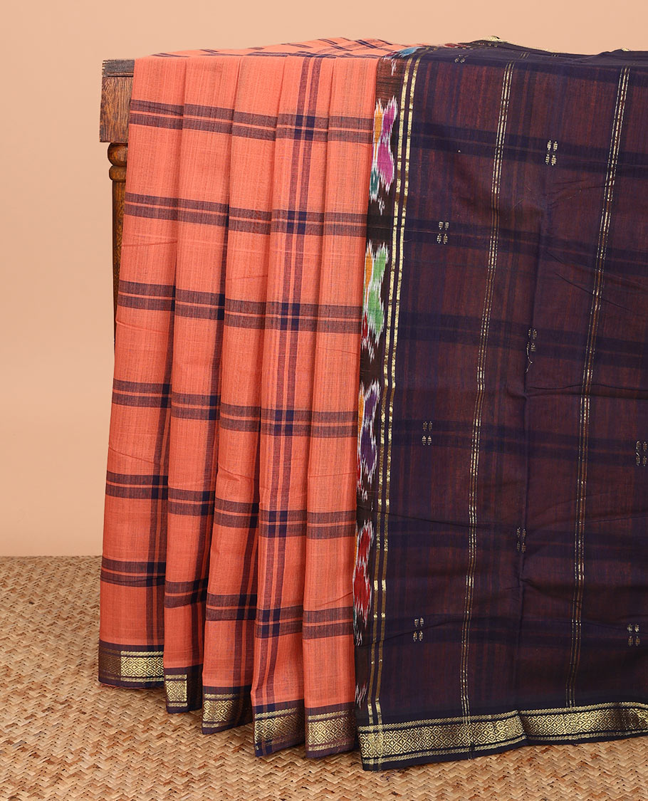 Peach checked Andhra cotton saree, contrast zari border, and pallu of checks and ikkat butterflies