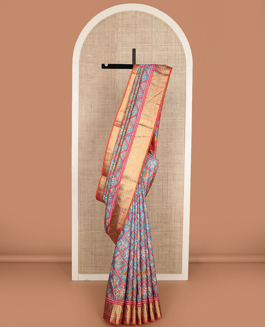 Blue unique motifs enclosed jaal design patola silk saree, contrast zari border, and pallu of paisley designs