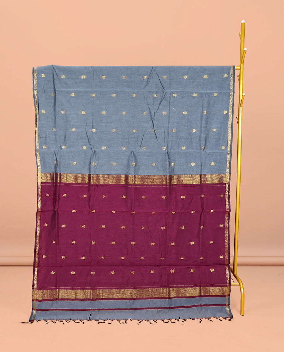 Grey Maheshwari Cotton Saree, Woven with Buttas All Over Its Body, Subtle Zari Piping Border, Complemented by a Contrast Pallu Steeped with Buttas, and Paired with a Contrast Blouse