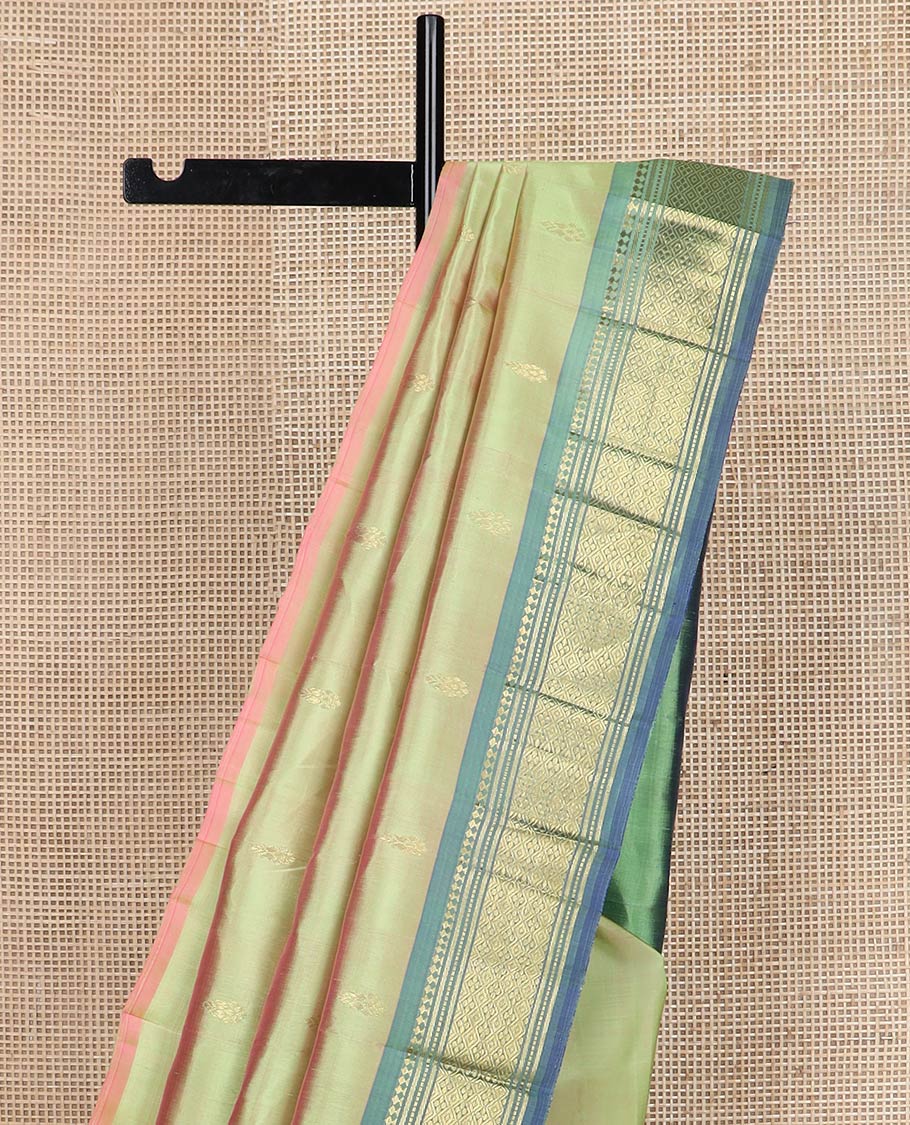 Green zari buttas kanchipuram silk saree, contrast one-sided korvai border of panner sombu,banaras,muthu & jaal & zari design pallu