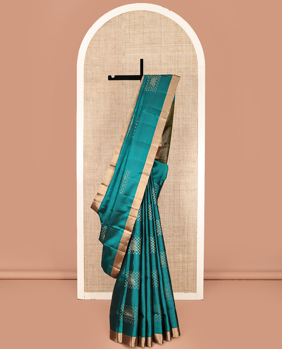 Green Mayuri Lite Silk Mix Saree, Detailed with Buttas All Over Its Body, Highlighted by a Zari Bavanji Border, Pallu of Intricate Designs, and Paired with a Contrast Blouse