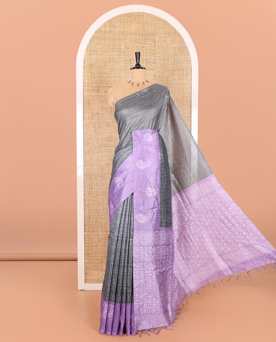 Grey and Lavender Semi-Tussar Saree Adorned with Vertical Stripes Printed Across the Body, Featuring a Contrast Paisley Motif Printed Border, an Intricately Designed Pallu of Jaal Design, and Paired with a Contrast Blouse