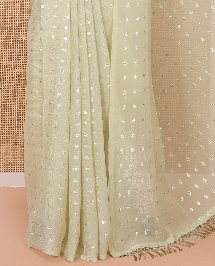Borderless Pale Green Shimmer Saree, Detailed with Zari Buttas All Over Its Body, Pallu Mirrors the Same Buttas, and Comes Without a Blouse