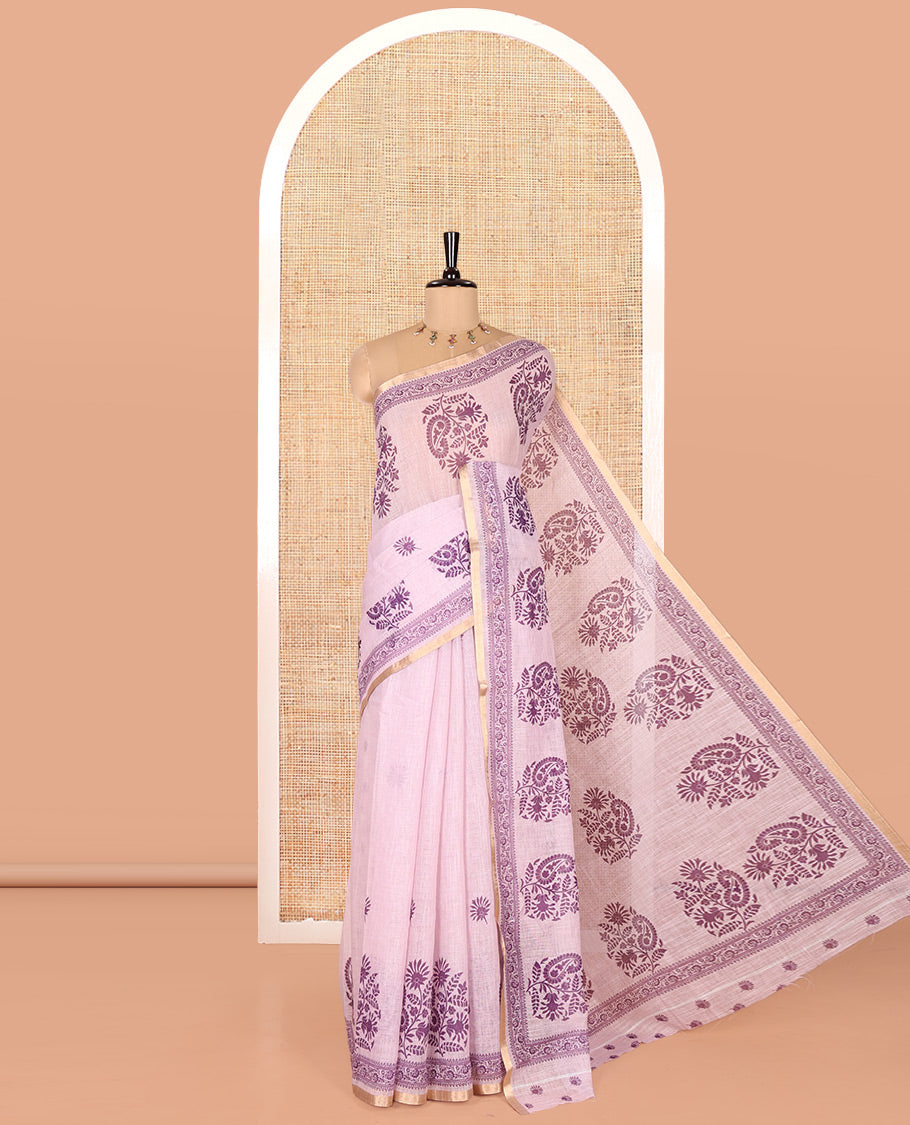 Pink Linen Cotton Saree, Beautiful Designed with Floral-Paisley Motifs Print All Over Its Body, Highlighted by Gold Zari Printed Border, Floral-Paisley Printed Pallu and Paired with a Matching Blouse