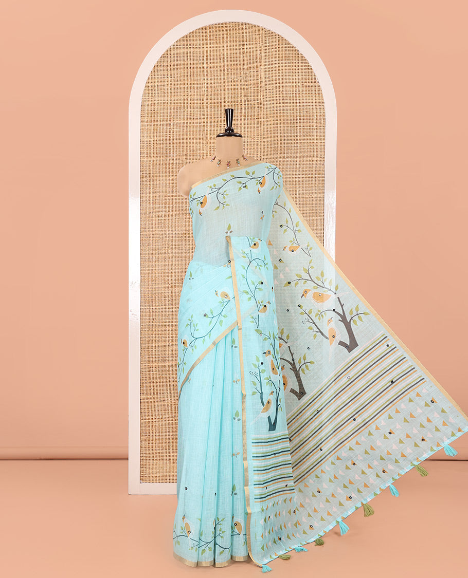 Sea Green Linen Cotton Saree, Adorned with Floral Vine Print and Mirror Work On Its Body, Subtle Piping Border, Pallu Steeped with Stripes, and Comes With a Contrast Blouse