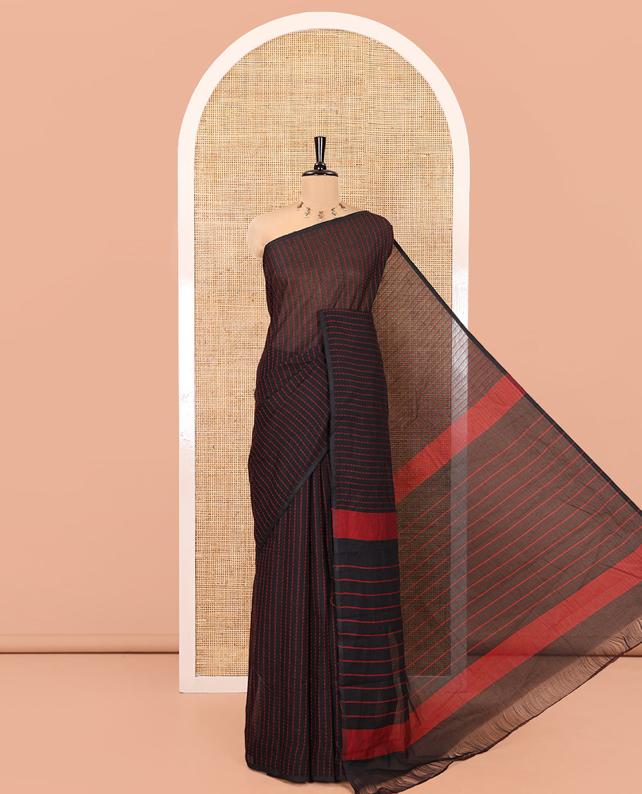 Borderless Black Chettinad Cotton Saree, Subtly Sparkled with Thread Stripes on Its Body, a Subtly Striped Pallu, and Has No Blouse
