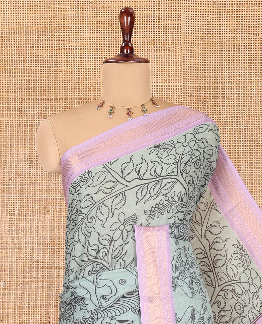 Green Mangalagiri Cotton Saree Features Kalamkari Flora-Fauna-Humans, a Contrast Border, and Printed Blouse