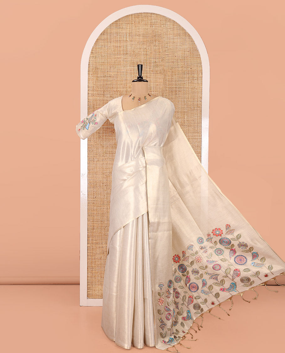 Borderless Off-White Tissue Saree, Enthralled with Colorful Floral-Bird Motif Printed with Outline Embroidery on Its Body, and Paired with a Readymade Elbow-Sleeve Round-Neck Blouse