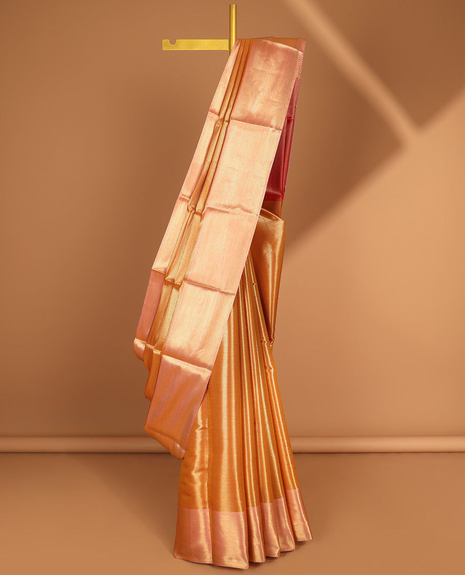 orange striped design semi tissue saree with contrast striped border & zari design pallu