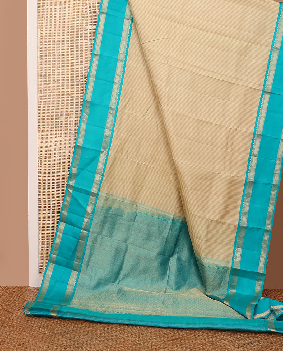 Cream striped & zari buttas silk saree, contrast jaal pallu & rettai pettu border of salngai, ara maadam & muthu designs