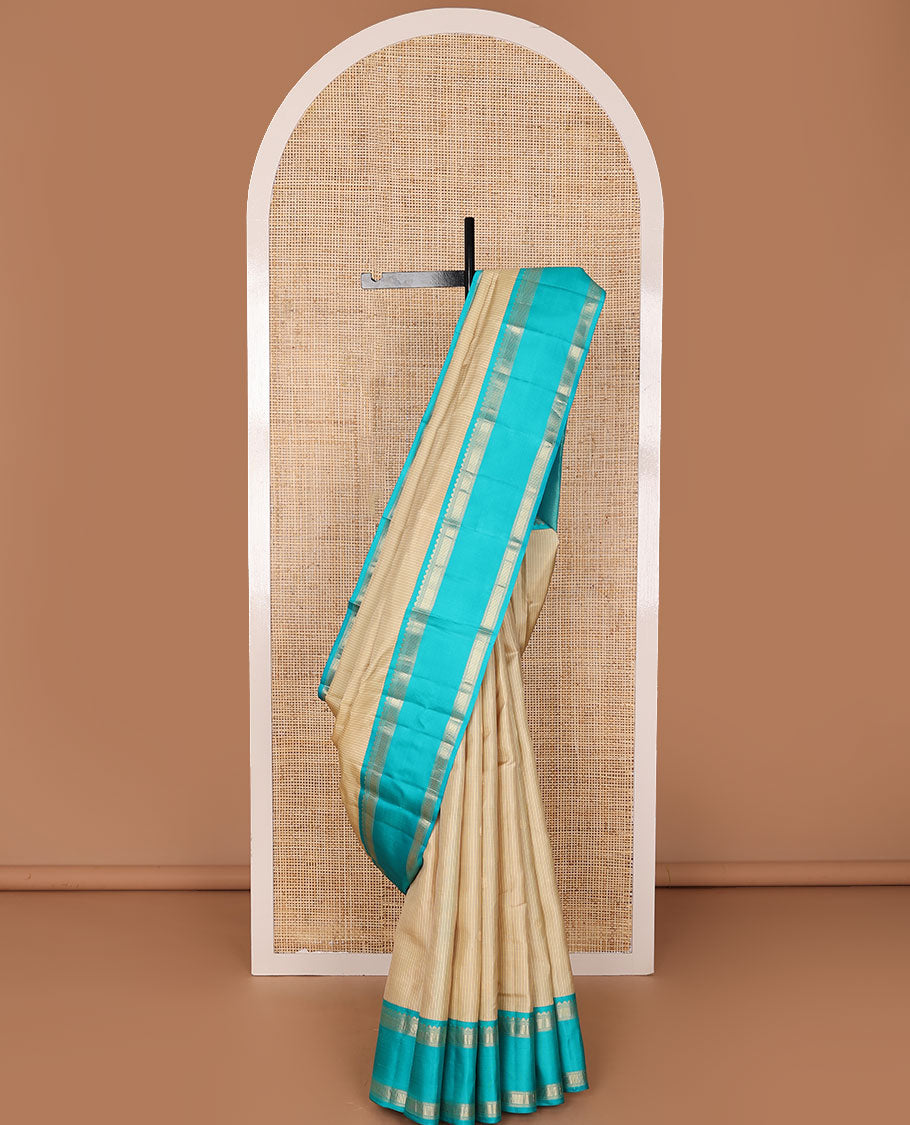 Cream striped & zari buttas silk saree, contrast jaal pallu & rettai pettu border of salngai, ara maadam & muthu designs