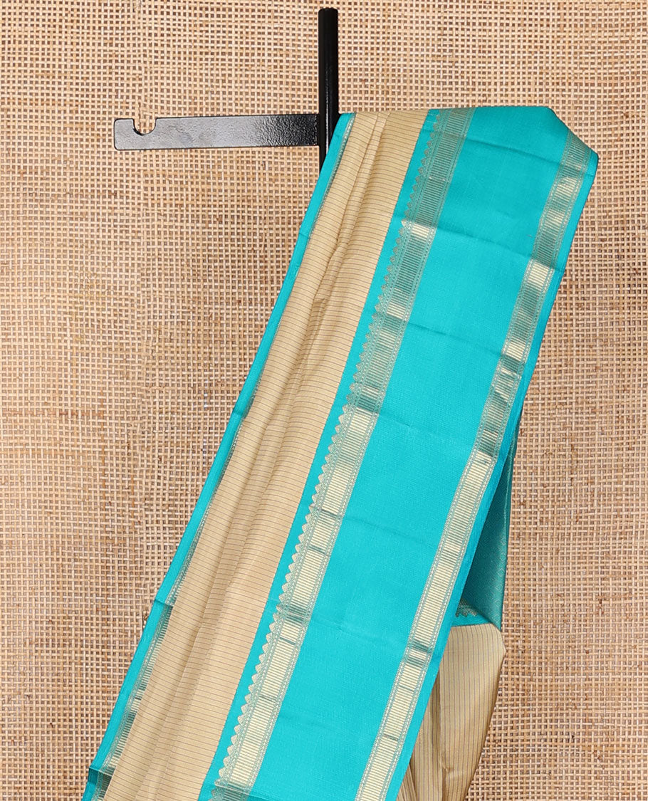 Cream striped & zari buttas silk saree, contrast jaal pallu & rettai pettu border of salngai, ara maadam & muthu designs