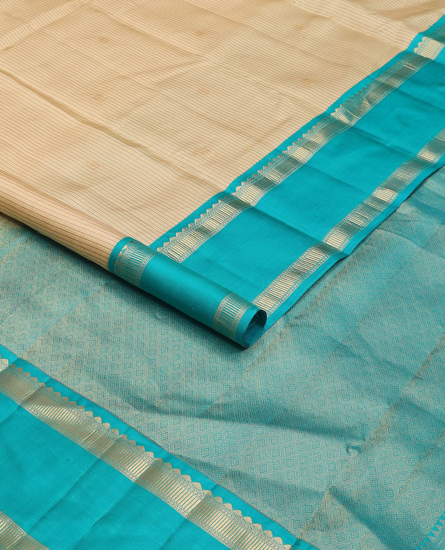 Cream striped & zari buttas silk saree, contrast jaal pallu & rettai pettu border of salngai, ara maadam & muthu designs