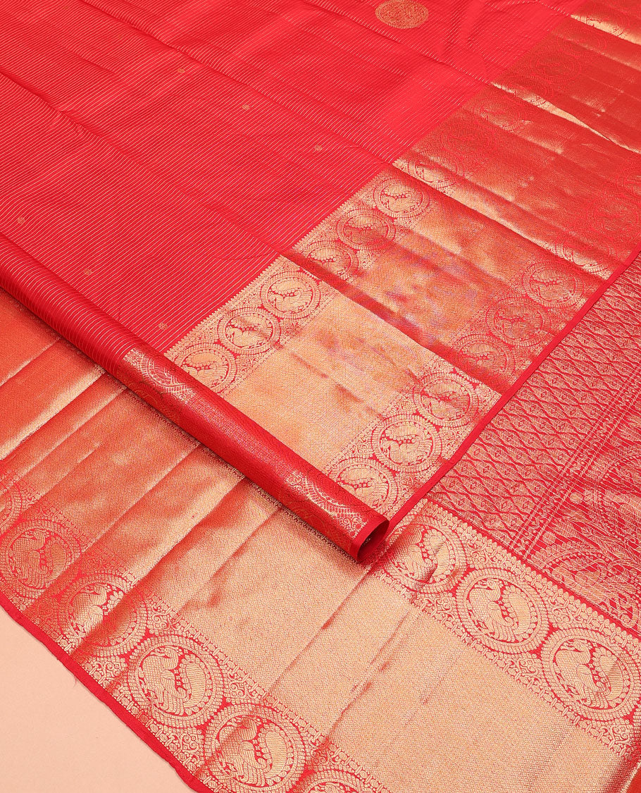 Red zari stripes and buttas Kanchipuram silk saree, zari border of thilakam, paisa, round mayil, and mayil kann designs, and jaal pallu
