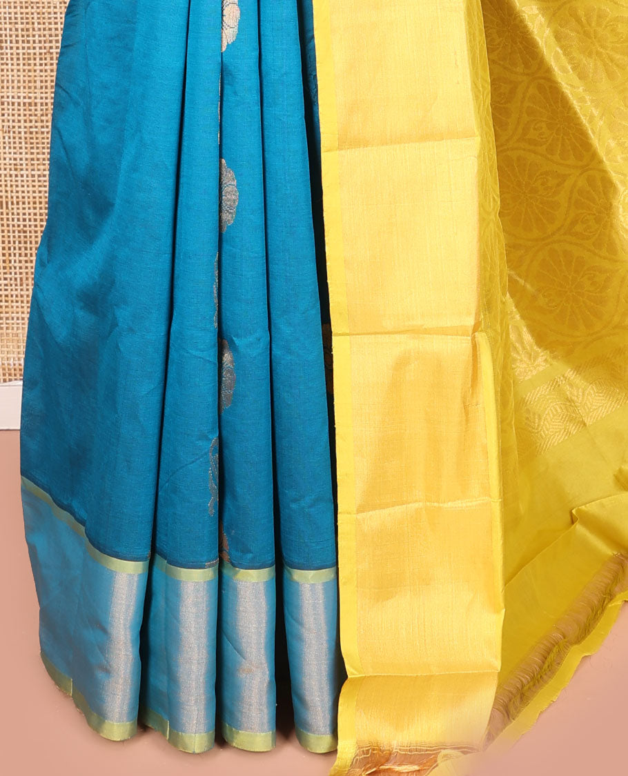 Blue Kuppadam Cotton Saree, Beautified with Zari Buttas on Its Body, Highlighted by Bavanji Zari Border, Complemented by Contrast Ogee Patterned Pallu, and Paired with a Contrast Blouse