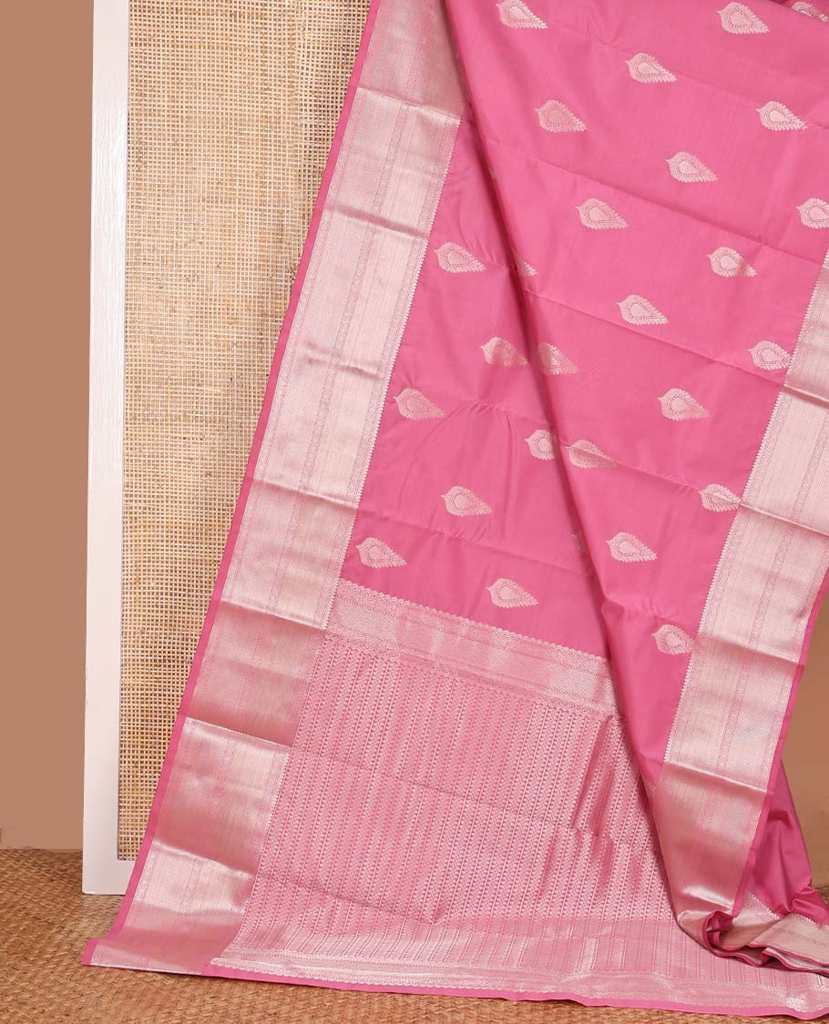Pink zari buttas Vasundhara silk mix saree, zari border of thilakam mokku, muthu, ogee, and mayil kann, and neli striped pallu