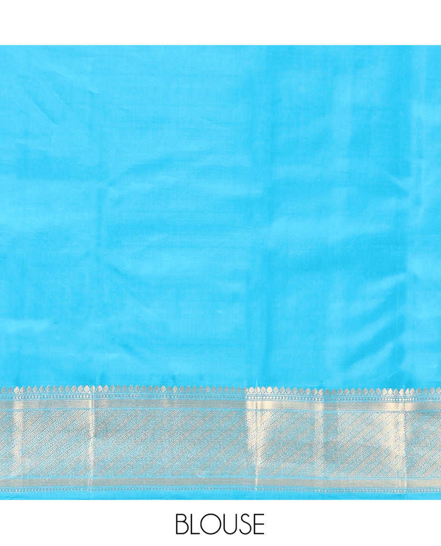 Blue Vasundhara Lite Silk Mix Saree, Adorned with Zari Buttas All Over Its Body, Highlighted by Zari Border of Thilakam Mokku, and Kodi Visiry Designs, Grand Jaal Pallu, and Paired with a Matching Blouse