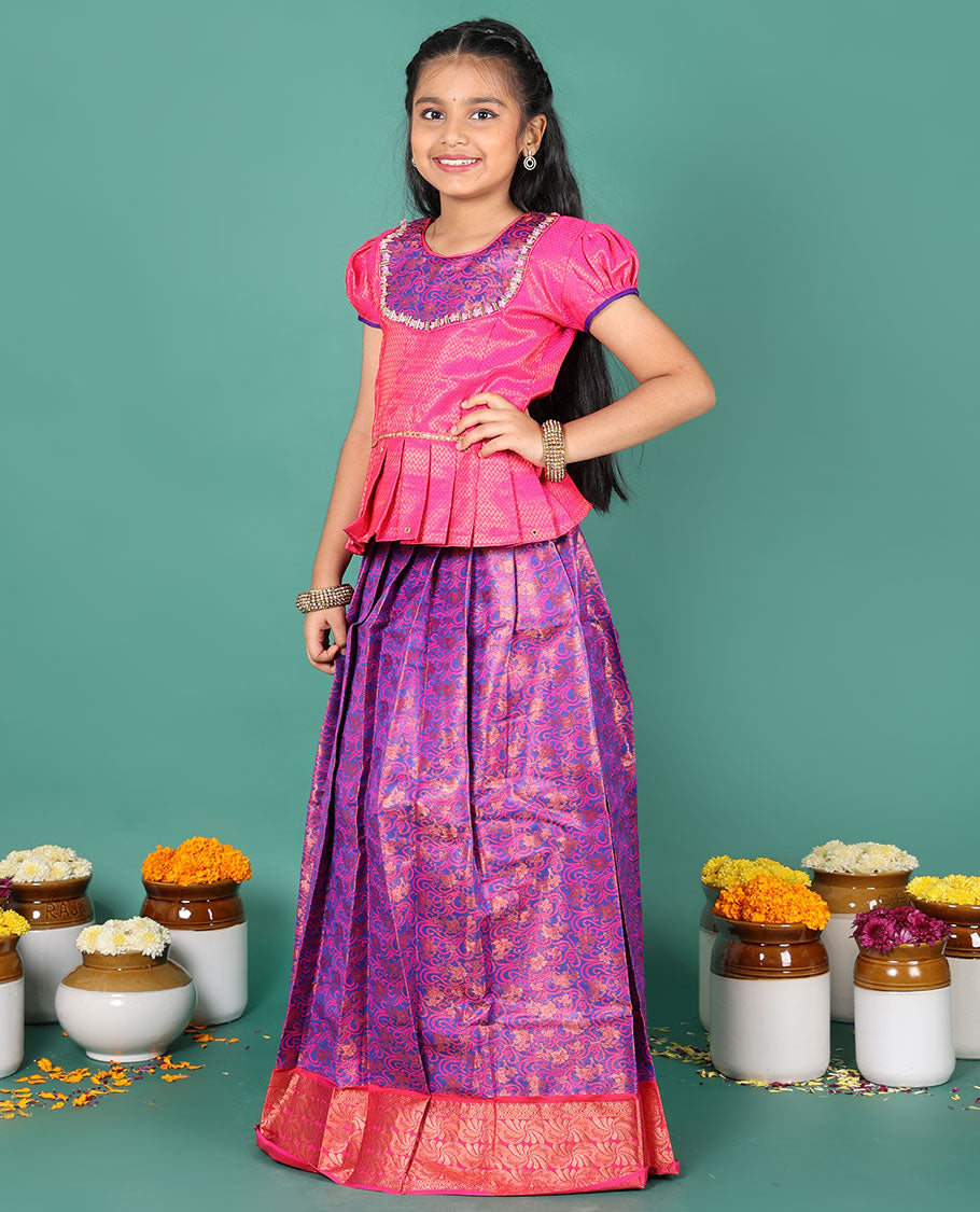 Blue readymade art silk pavadai, jacquard, and contrast zari border skirt, and contrast jacquard embroidered puff-sleeve blouse