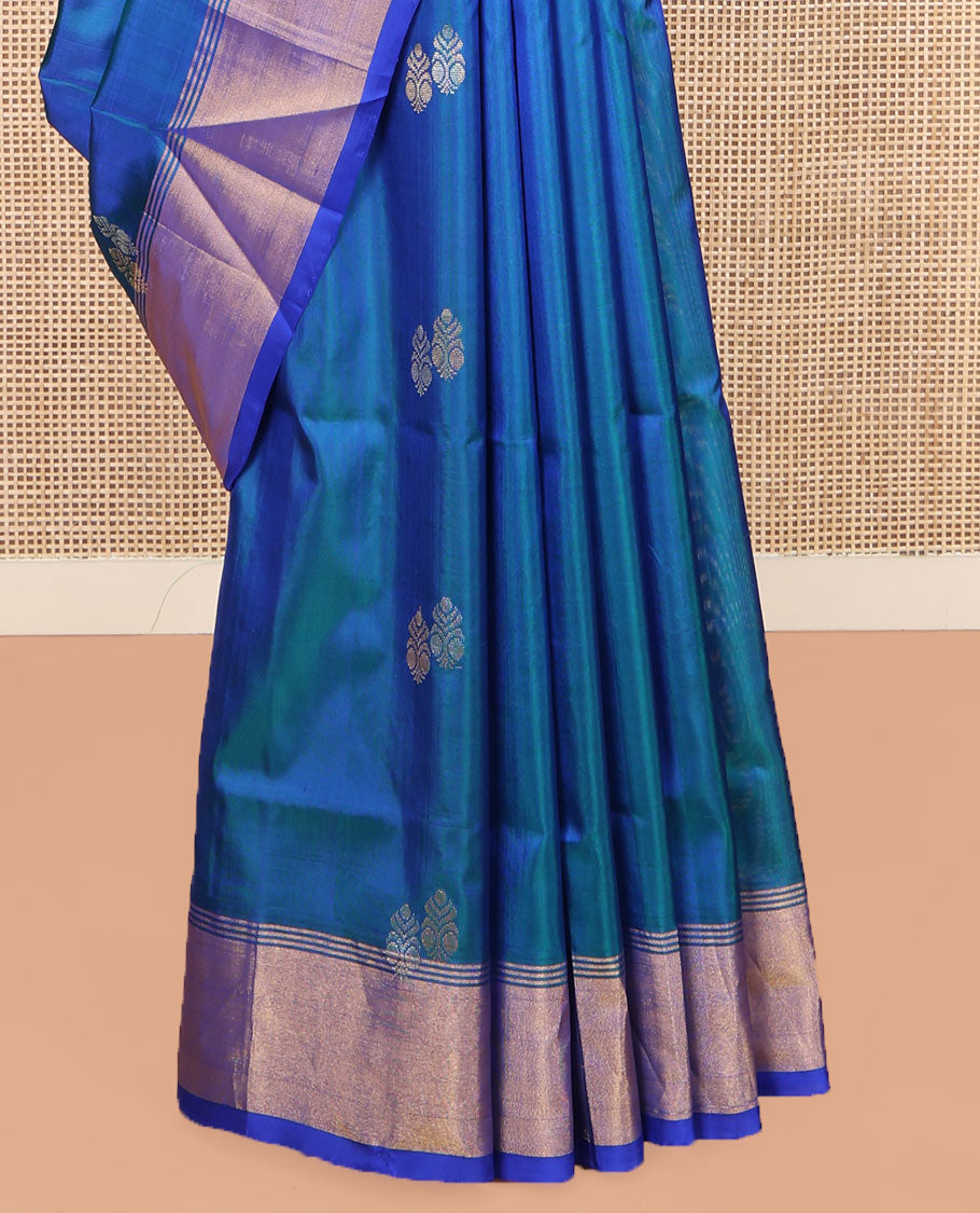 Blue Uppada Silk Saree, Embellished with Zari Buttas on Its Body, Complemented by Contrast Border, Pallu Steeped with Floral Zari Buttas, and Paired with a Contrast Blouse