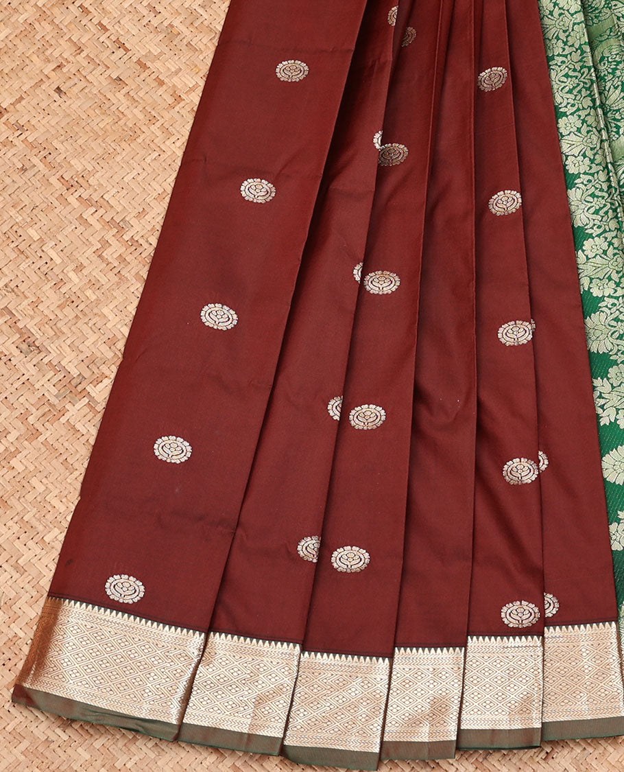 Brown Budget Silk Saree, Opulently Embellished with Zari Buttas, Complemented by a Contrast Traditional Zari Design Border, Grand Floral Design Pallu, and Paired with a Contrast Blouse