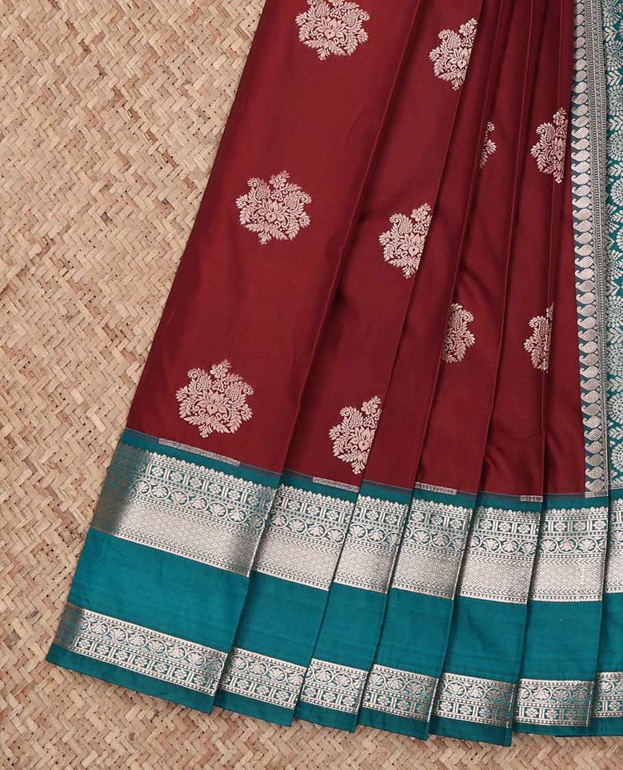 Maroon Budget Silk Saree, Featuring Zari Buttas All Over Its Body, Complemented by a Contrast Traditional Zari Design Rettai Pettu Border, Intricately Designed Pallu, and Paired with a Contrast Blouse