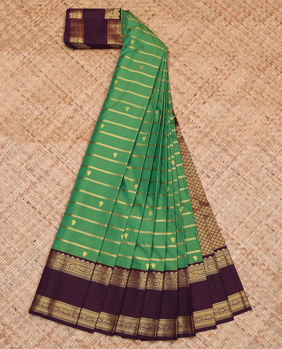 Green Budget Silk Saree, Bedecked with Zari Buttas and Stripes, Contrast Traditional Zari Rettai Pettu Border, Grand Jaal Pallu, and a Contrast Blouse