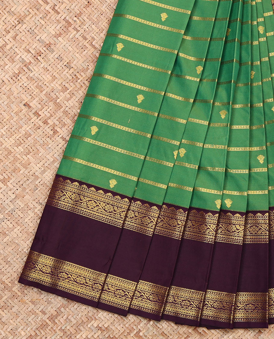 Green Budget Silk Saree, Bedecked with Zari Buttas and Stripes, Contrast Traditional Zari Rettai Pettu Border, Grand Jaal Pallu, and a Contrast Blouse