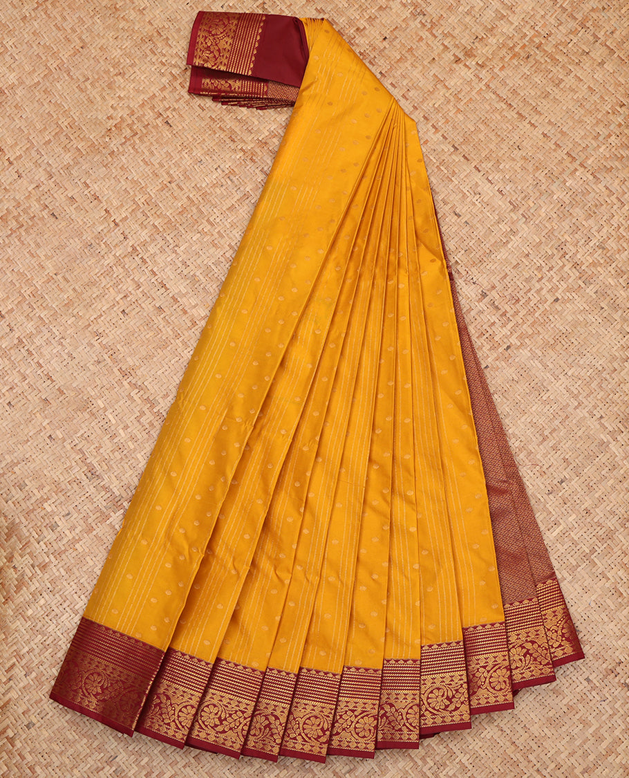 Yellow Budget Silk Saree, Sparsely Threaded with Buttas and Stripes, a Contrast Traditional Zari Border, Grand Pallu, and a Contrast Blouse