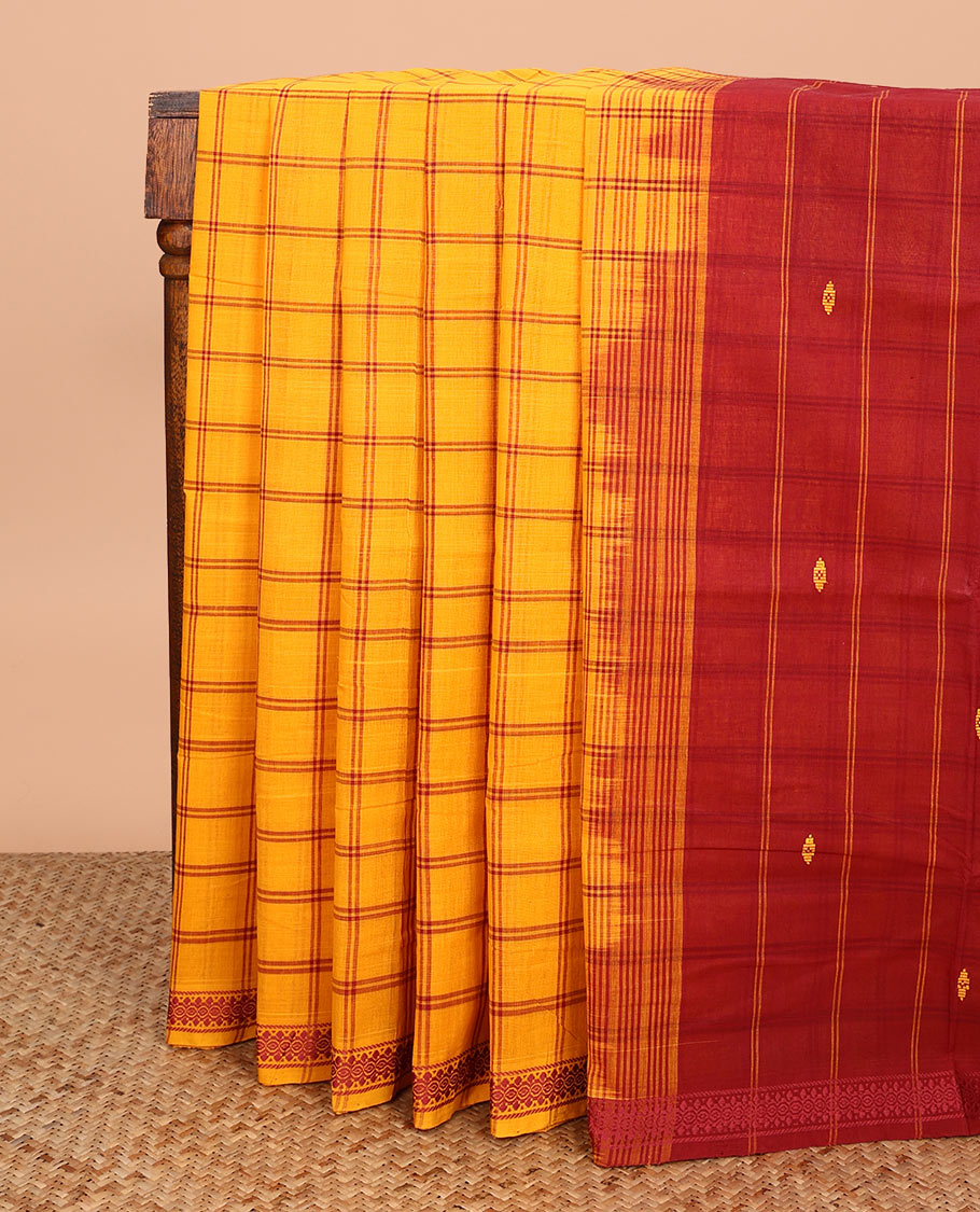 Orange buttas enclosed checked Andhra cotton saree, thread woven border, and pallu of stripes and buttas