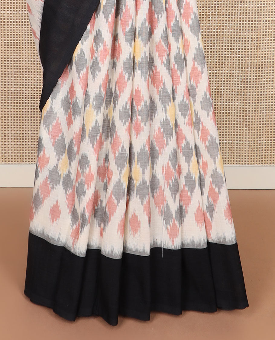 Cream-base multi-color jaal-patterned ikkat cotton saree, contrast plain border & chevron striped pallu