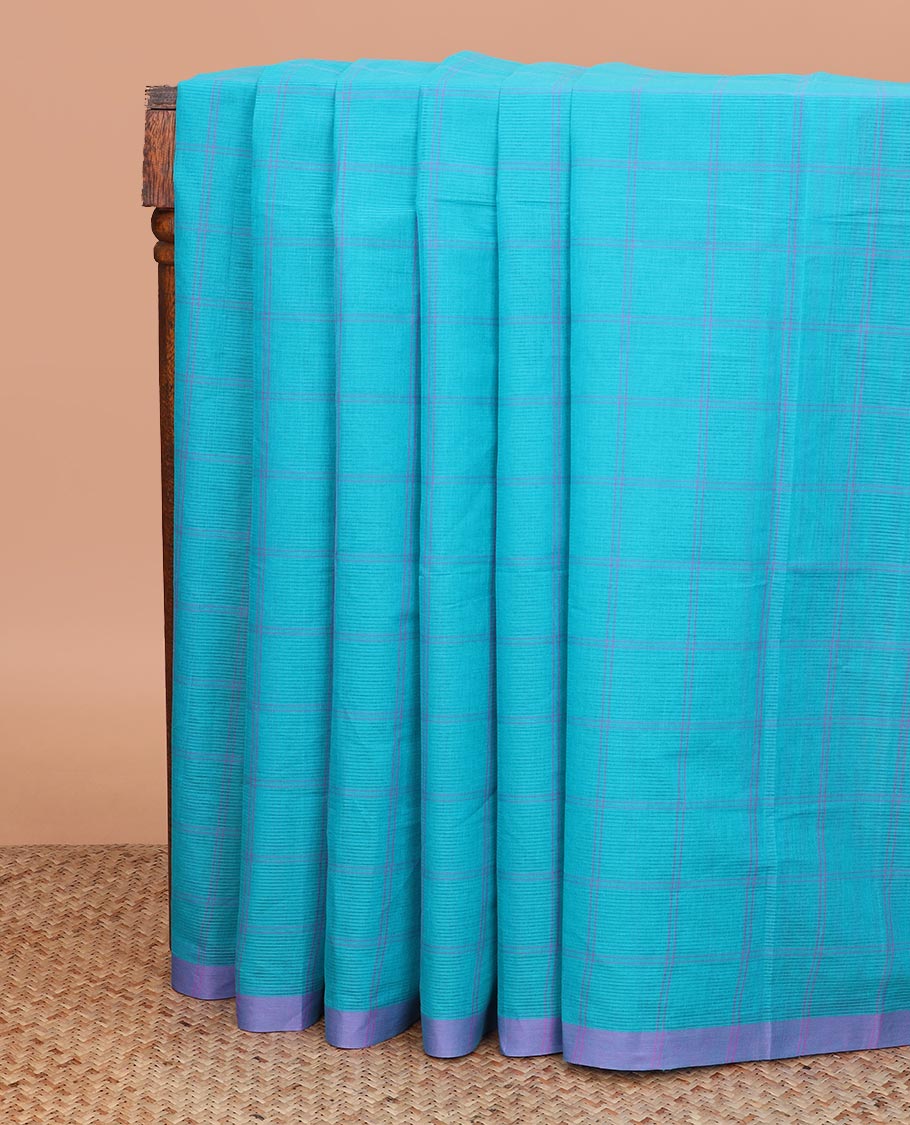 Blue checked Mangalgiri cotton saree, striped border, striped pallu, and contrast floral printed blouse