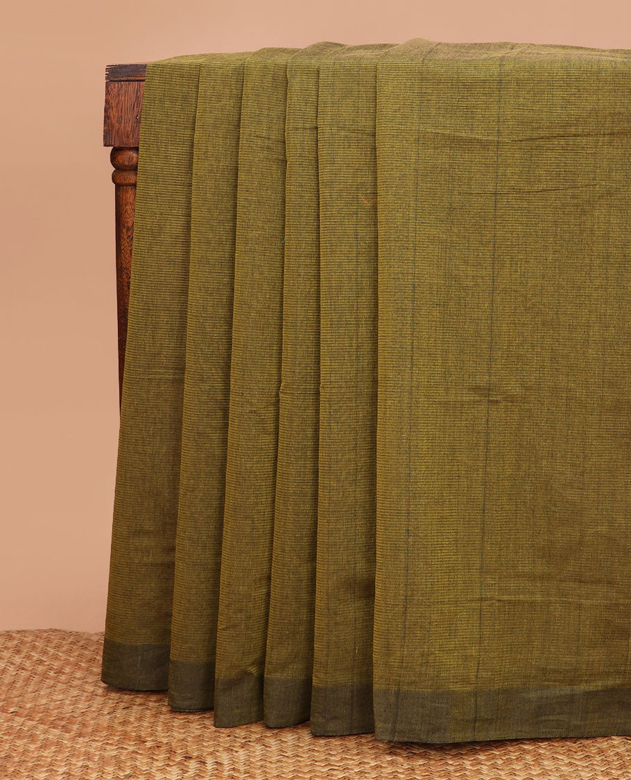 Green striped chirala cotton saree, plain border, and contrast floral and leaf printed blouse