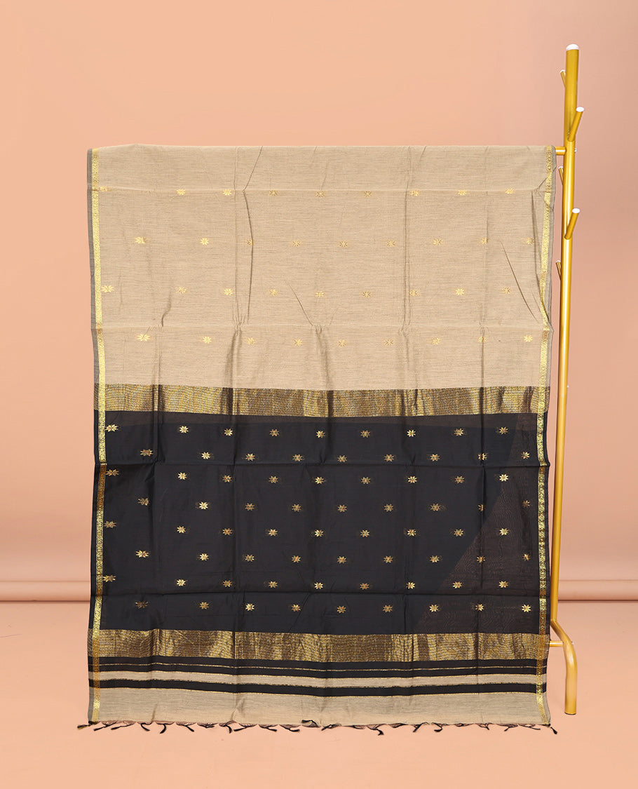 Beige Maheshwari Cotton Saree, Featuring Buttas All Over Its Body, Subtle Zari Piping Border, Complemented by a Contrast Pallu Steeped with Buttas, and Paired with a Contrast Blouse