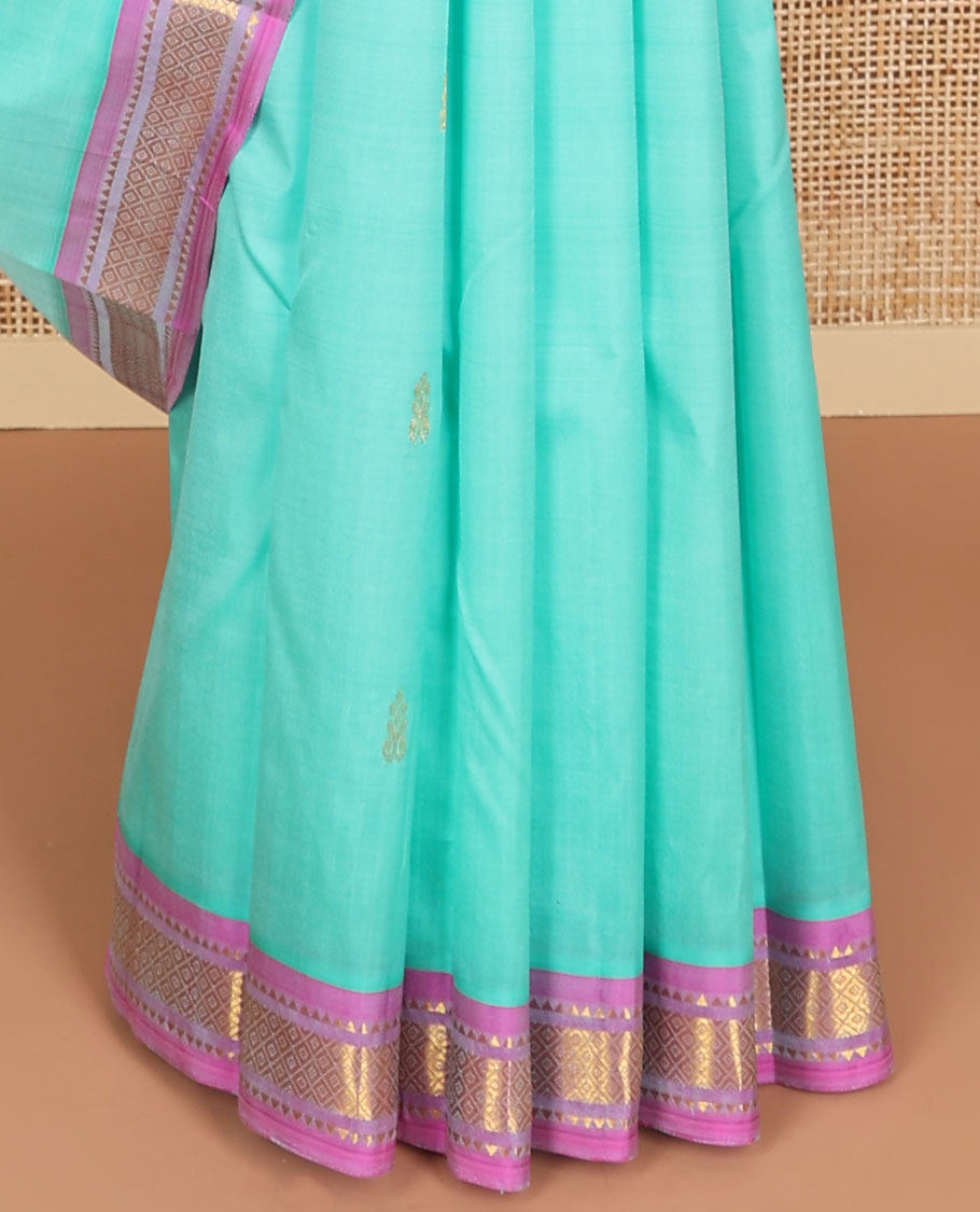 Light blue floral buttas kancheepuram silk saree with contrast border of rekku, kayil kann design & floral design pallu