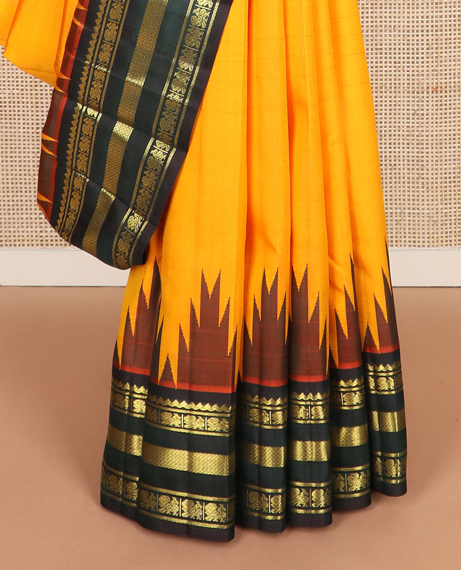Orange zari buttas kanchipuram silksaree, contrast one-sided thazampoo rekku border of salngai,banaras,mayil & vanki & zari design pallu
