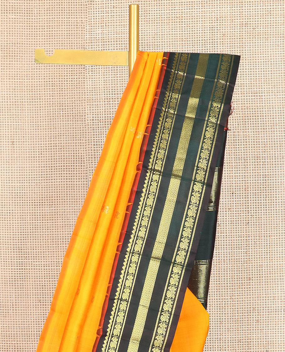 Orange zari buttas kanchipuram silksaree, contrast one-sided thazampoo rekku border of salngai,banaras,mayil & vanki & zari design pallu