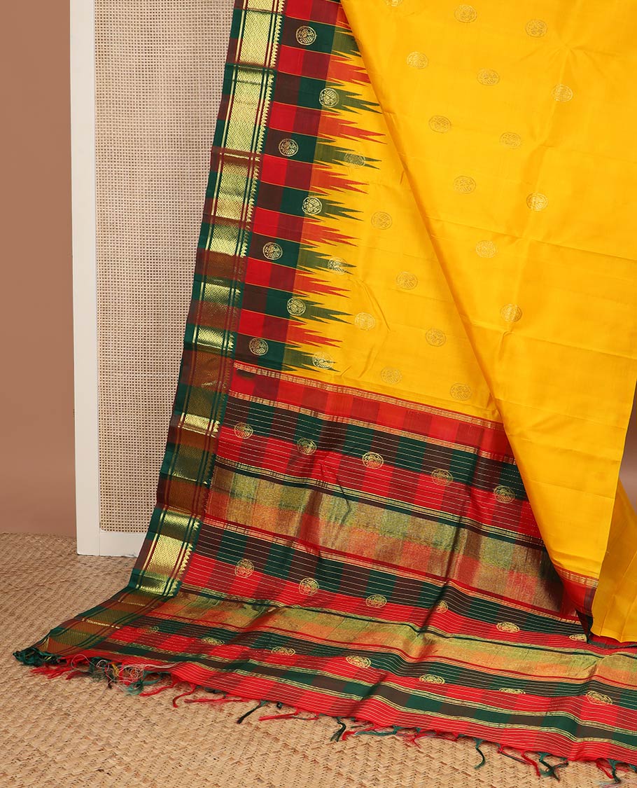 Yellow zari buttas kanchipuram silk saree, contrast one-sided checked thazampoo rekku round mayil zari border & zari woven pallu