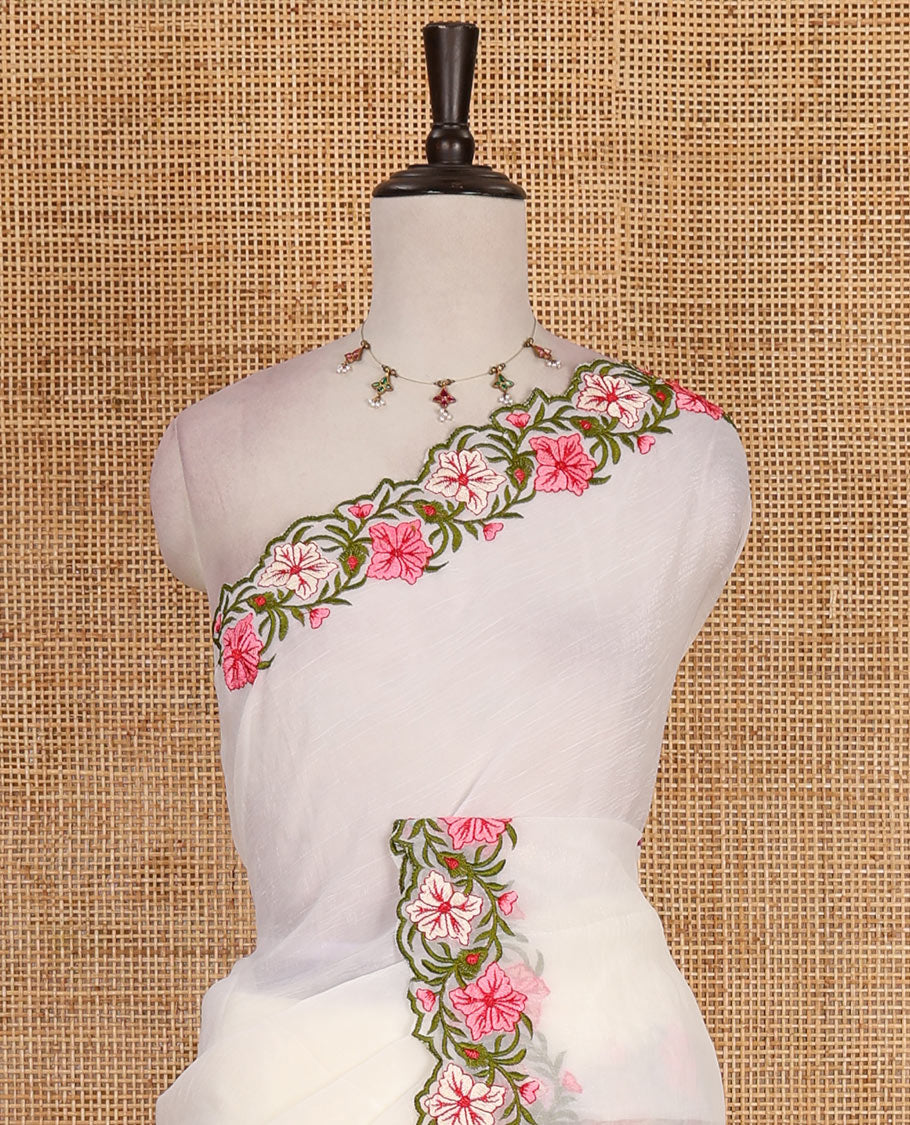Half- white full-plain crunchy crushed saree, scallop floral creeper thread embroidered border, and floral embroidered matching blouse