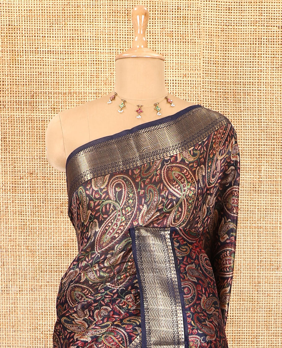 Navy blue paisley motifs printed green silk saree, traditional zari border, paisley printed pallu, and a matching blouse