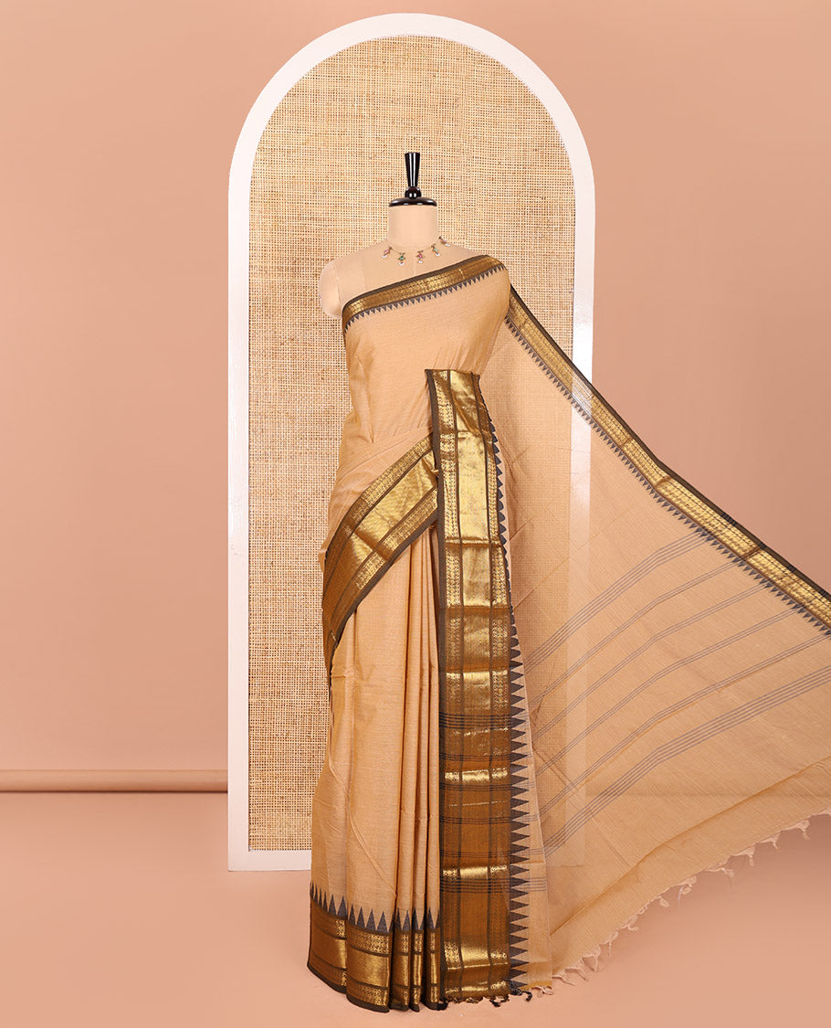 Sandal Plain Chettinad Cotton Saree, Complemented by Contrast Temple Border of Traditional Zari Designs, Subtly Striped Pallu, and Paired with a Matching Blouse