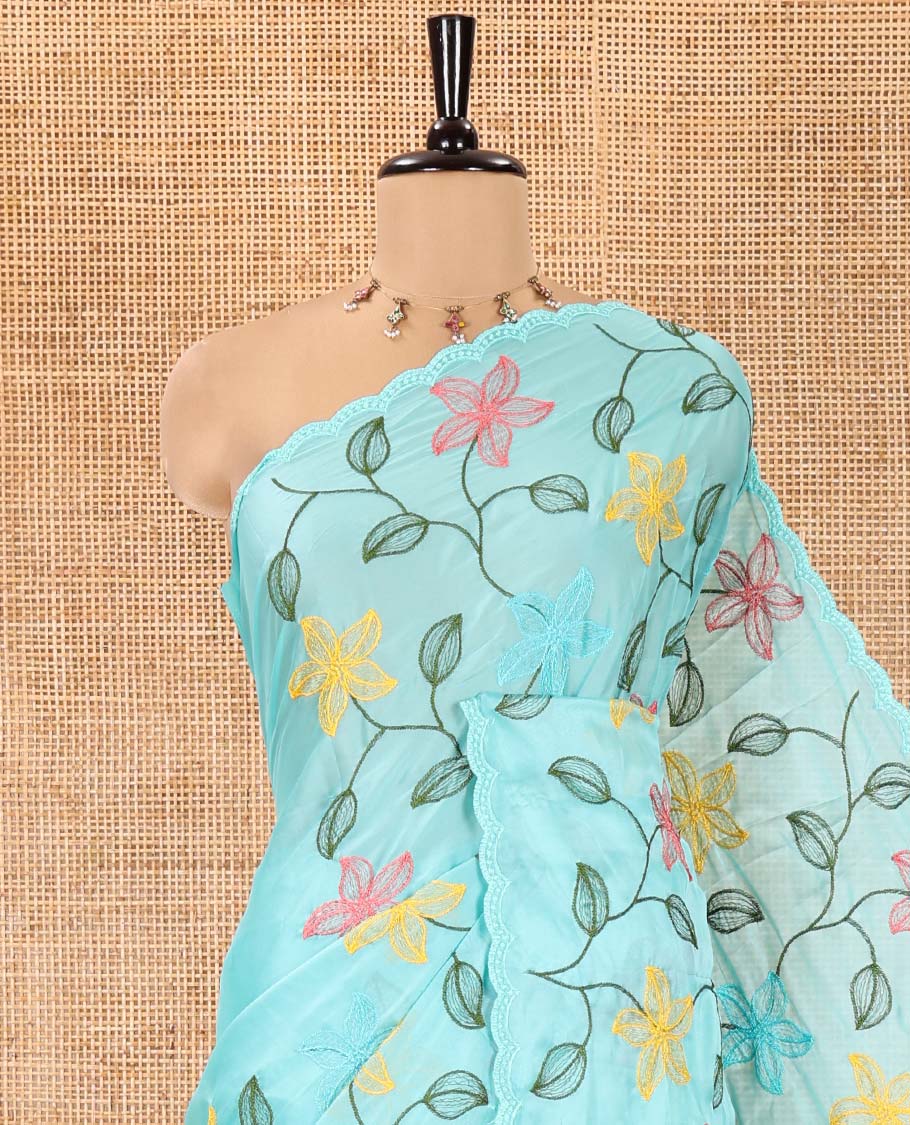 Sea Green Rangoli Chiffon Saree, Beautified with Multi-Color Floral Vine Embroidery on Its Body, Floral Embroidered Pallu, and Contrast Floral Embroidered Blouse