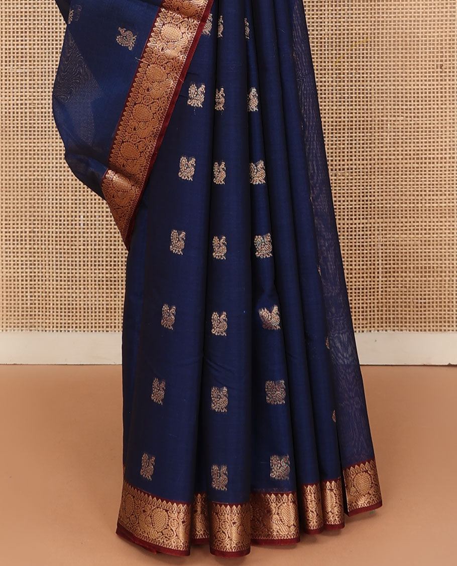Blue peacock and chakra motifs silk cotton saree, contrast traditional zari border and pallu of butta enclosed checks