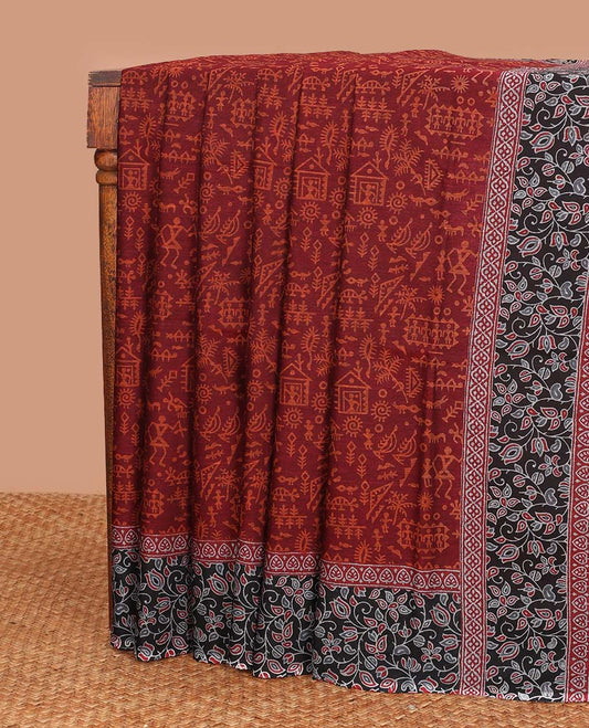 Maroon warli village printed mul mul cotton saree, contrast floral vine printed border, and floral printed pallu